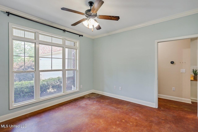 spare room featuring a ceiling fan, baseboards, a wealth of natural light, and finished concrete flooring