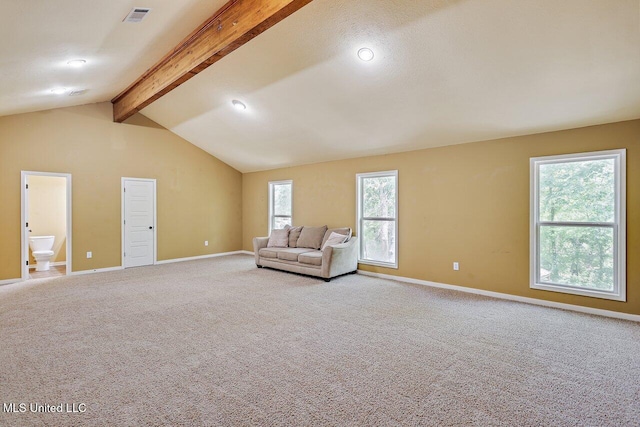 living area with visible vents, carpet flooring, baseboards, and vaulted ceiling with beams