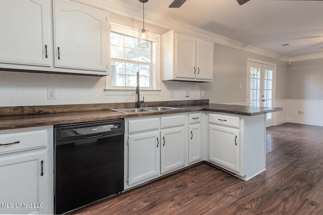 kitchen with dishwasher, sink, kitchen peninsula, plenty of natural light, and white cabinetry