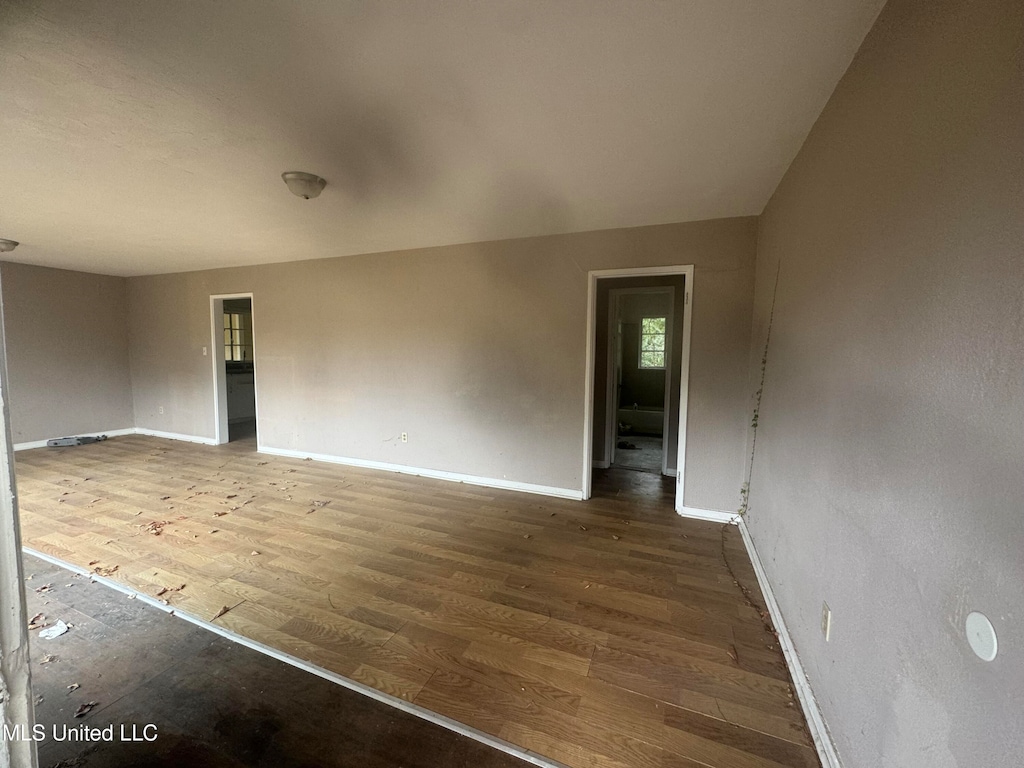 unfurnished room featuring hardwood / wood-style floors