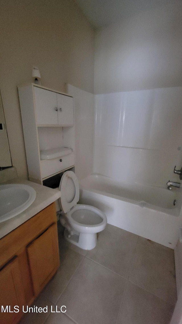 full bathroom featuring vanity, shower / bathing tub combination, toilet, and tile patterned floors