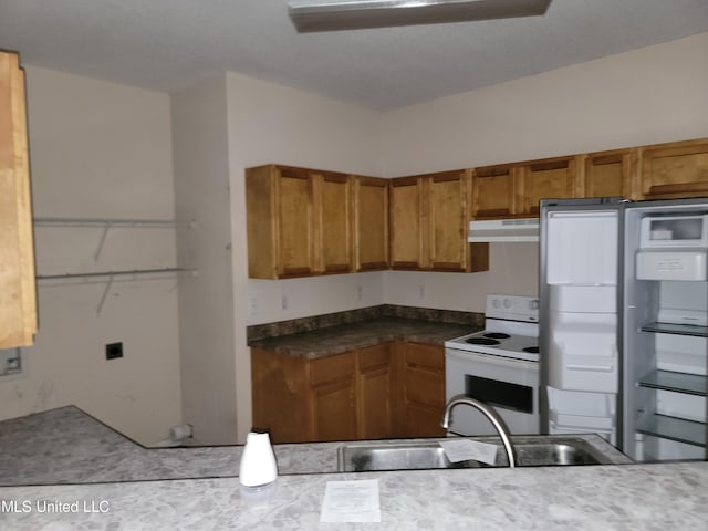 kitchen with sink and white appliances