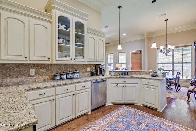 510 Belle Oak Pl, Brandon, MS 39042 - kitchen featuring stainless steel dishwasher, a sink, a peninsula, a chandelier, and wood finished floors