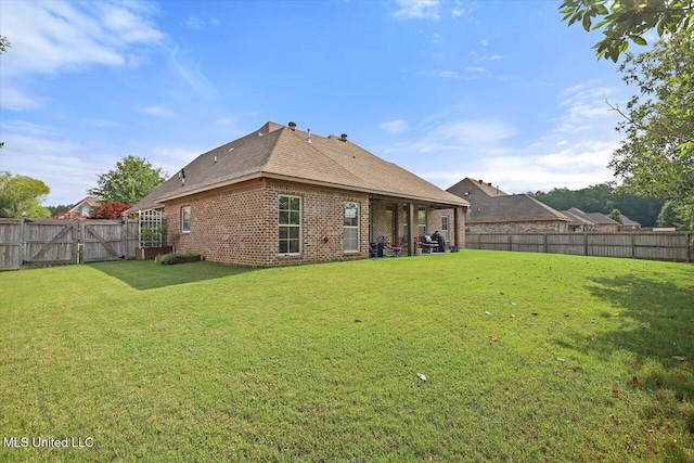 510 Belle Oak Pl, Brandon, MS 39042 - rear view of house with brick siding, a gate, and roof with shingles