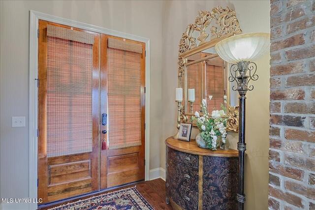 510 Belle Oak Pl, Brandon, MS 39042 - foyer entrance featuring french doors, wood finished floors, and baseboards
