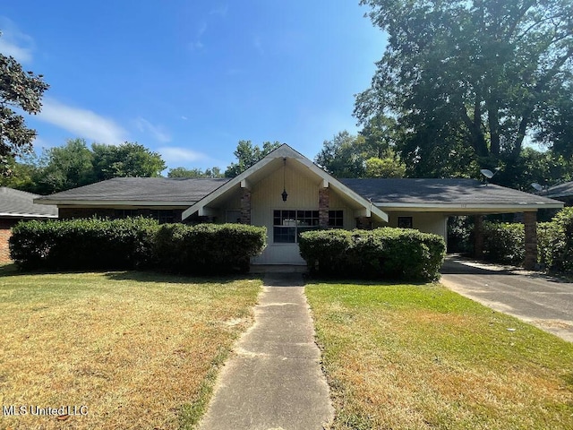 112 Brookfield Dr, Natchez, MS 39120 - view of front of property with a carport, concrete driveway, and a front yard