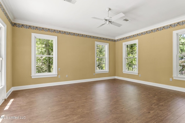 unfurnished room with ornamental molding, dark hardwood / wood-style floors, and ceiling fan