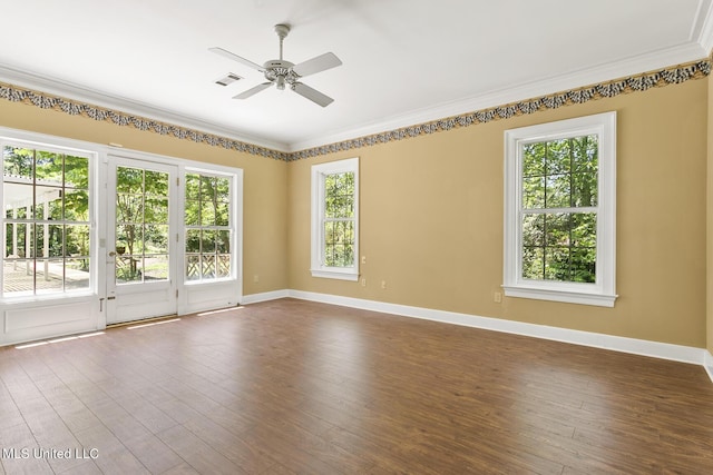 unfurnished room featuring ornamental molding, dark hardwood / wood-style floors, and ceiling fan