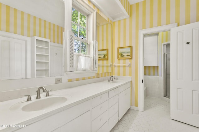 bathroom with vanity and tile patterned floors