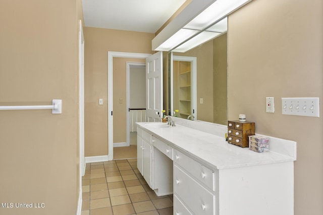 bathroom with vanity and tile patterned floors