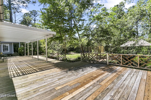 wooden terrace featuring a pergola