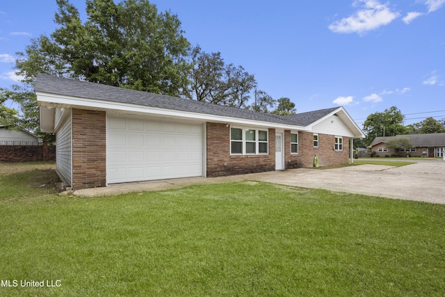 ranch-style house with brick siding, driveway, a front yard, and a garage