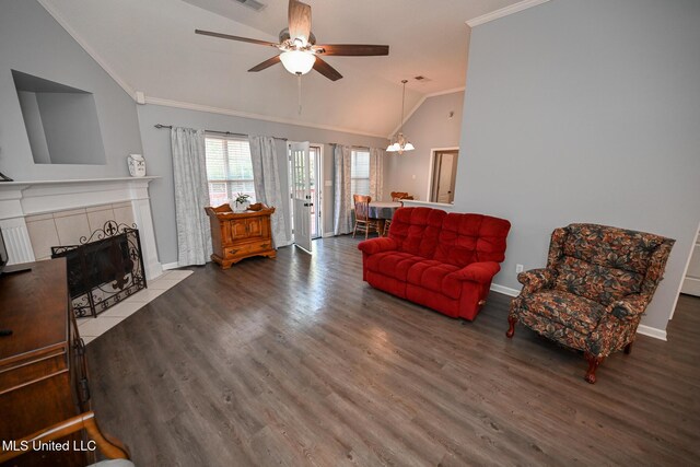 6126 Rolling Oaks Cv, Olive Branch, MS 38654 - living room featuring baseboards, ornamental molding, ceiling fan with notable chandelier, and lofted ceiling