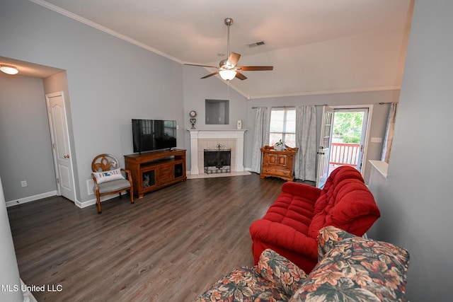 6126 Rolling Oaks Cv, Olive Branch, MS 38654 - living area with a ceiling fan, visible vents, a tile fireplace, dark wood-style floors, and lofted ceiling