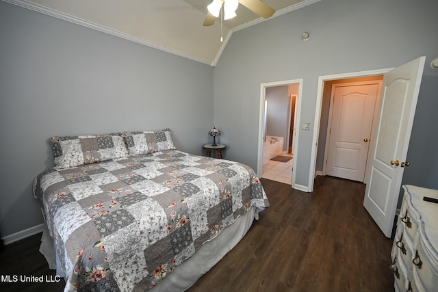 bedroom with ceiling fan, vaulted ceiling, dark hardwood / wood-style floors, crown molding, and ensuite bath