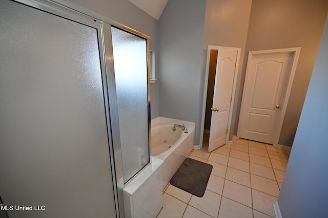 6126 Rolling Oaks Cv, Olive Branch, MS 38654 - full bathroom featuring tile patterned floors, baseboards, a whirlpool tub, and a shower stall