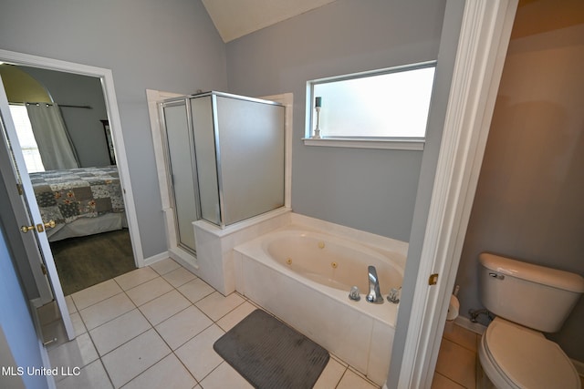 bathroom featuring a healthy amount of sunlight, lofted ceiling, shower with separate bathtub, and toilet