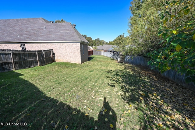 6126 Rolling Oaks Cv, Olive Branch, MS 38654 - view of yard with a fenced backyard