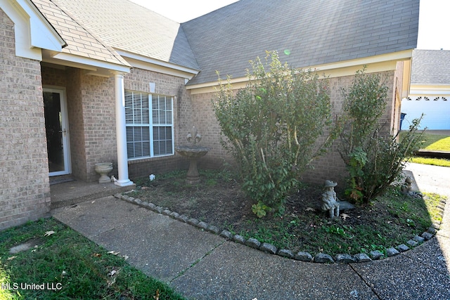 6126 Rolling Oaks Cv, Olive Branch, MS 38654 - exterior space with brick siding and a shingled roof