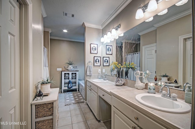 512 Sweetwater, Brandon, MS 39047 - bathroom with tile patterned floors, visible vents, double vanity, and a sink