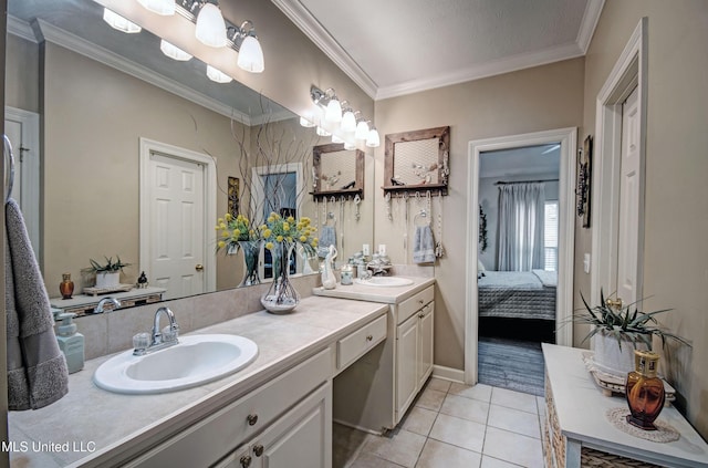 512 Sweetwater, Brandon, MS 39047 - bathroom featuring tile patterned floors, double vanity, ornamental molding, and a sink