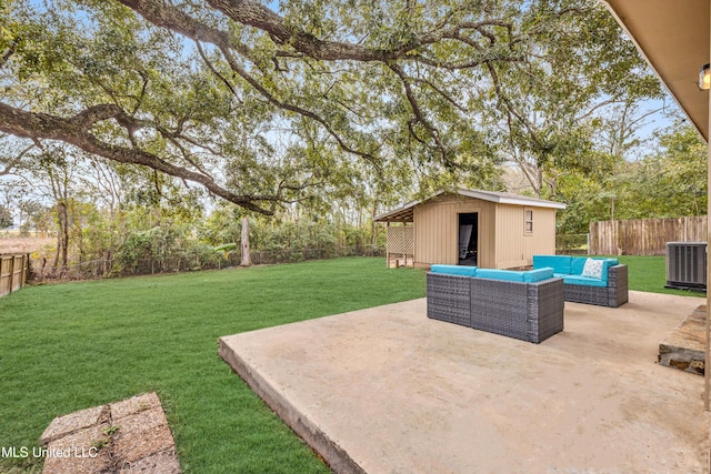 view of yard with a patio area, cooling unit, outdoor lounge area, and a storage shed