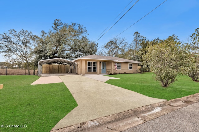 single story home with a front yard and a carport