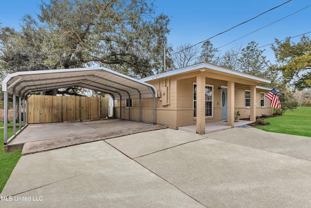 exterior space featuring a carport