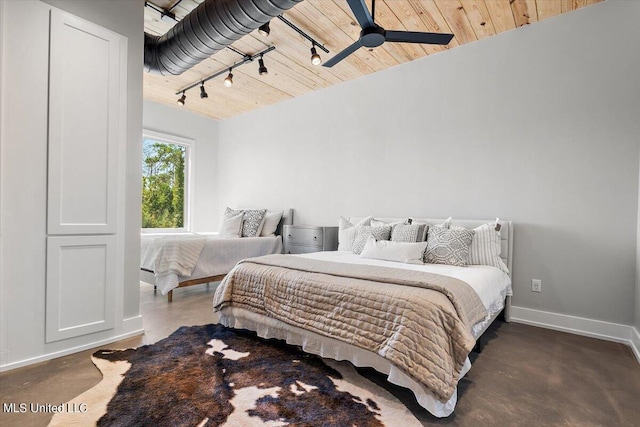 bedroom with ceiling fan, wood ceiling, and rail lighting