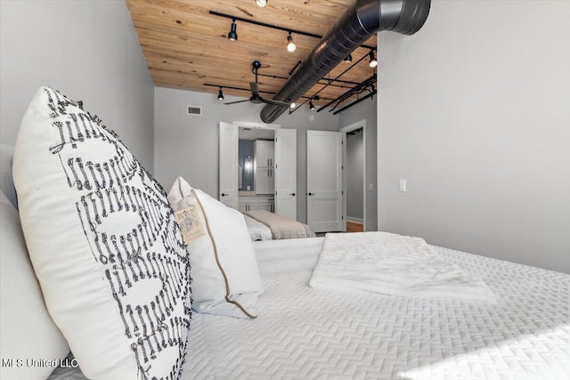 bedroom featuring wooden ceiling