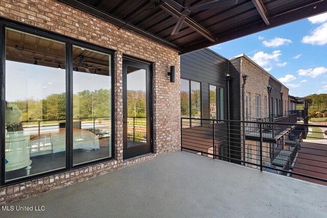 view of patio with a balcony