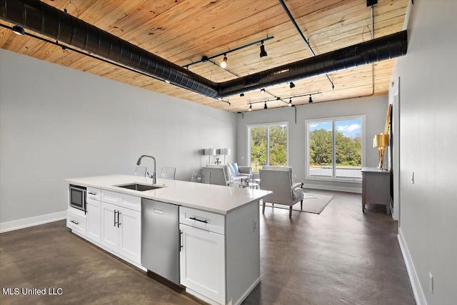 kitchen with wooden ceiling, rail lighting, appliances with stainless steel finishes, sink, and white cabinetry