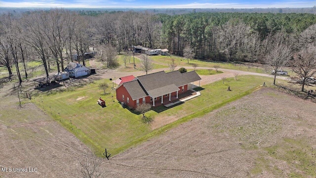 bird's eye view with a rural view and a forest view