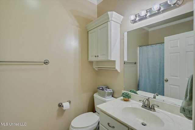 bathroom featuring toilet, curtained shower, crown molding, and vanity