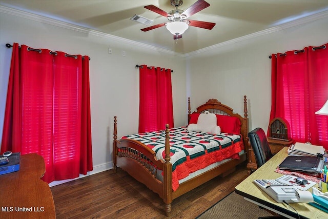 bedroom featuring wood finished floors, visible vents, baseboards, a ceiling fan, and ornamental molding