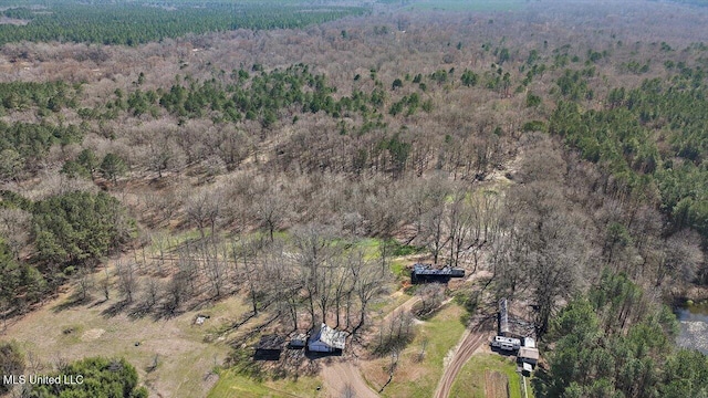 drone / aerial view with a view of trees