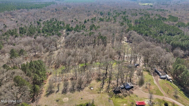 bird's eye view featuring a view of trees