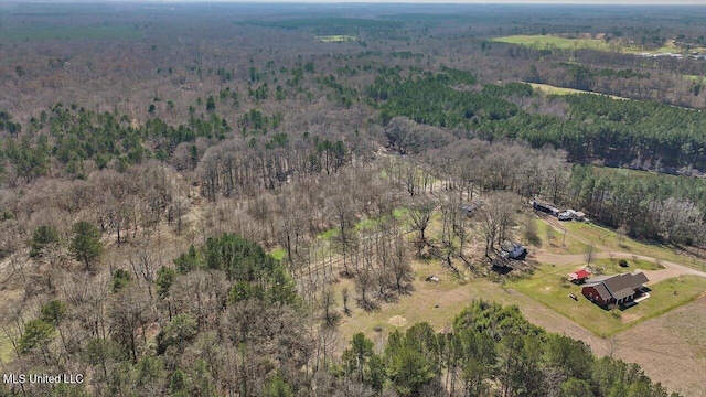 bird's eye view with a rural view and a wooded view