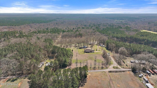 bird's eye view featuring a forest view