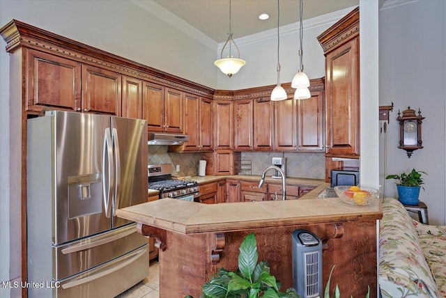 kitchen with decorative backsplash, stainless steel appliances, light countertops, under cabinet range hood, and a sink