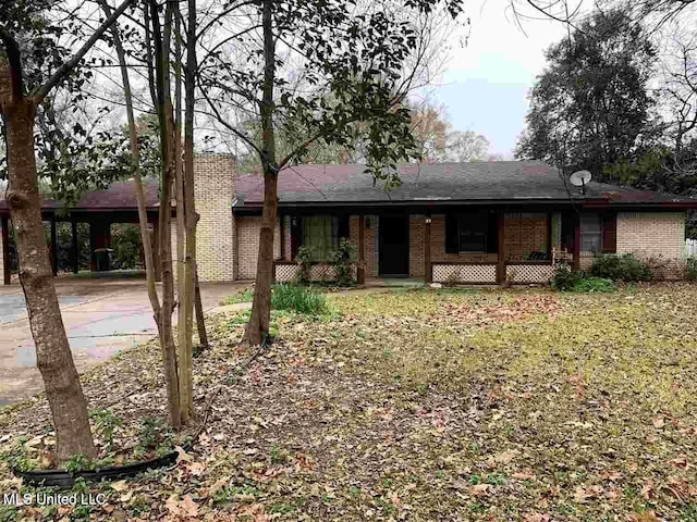 236 E Moon St, Ridgeland, MS 39157 - ranch-style home featuring brick siding and a porch