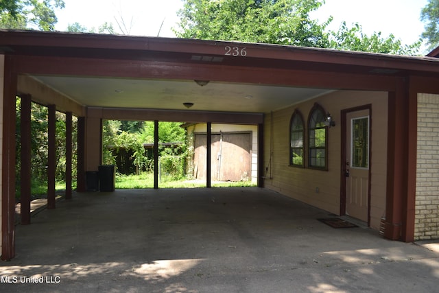 236 E Moon St, Ridgeland, MS 39157 - view of patio with an attached carport