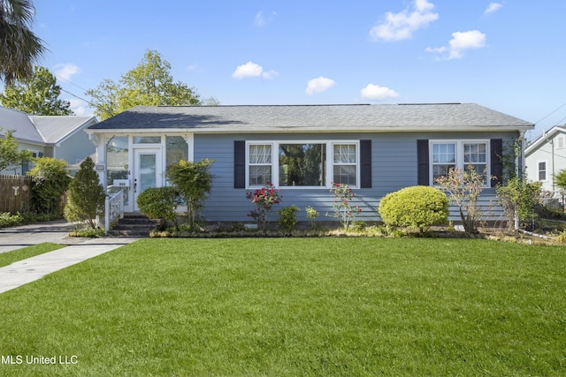 ranch-style house with a front yard