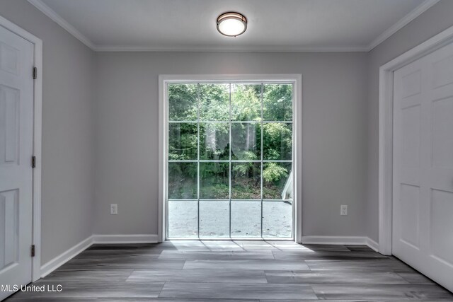 767 Sherwood Dr, Jackson, MS 39216 - entryway with ornamental molding, baseboards, and wood finished floors