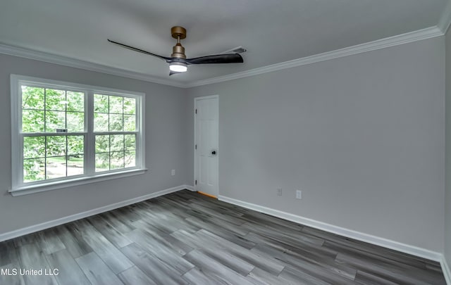 767 Sherwood Dr, Jackson, MS 39216 - spare room with crown molding, wood finished floors, baseboards, and a ceiling fan