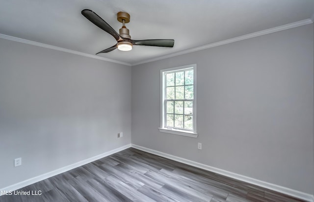 767 Sherwood Dr, Jackson, MS 39216 - spare room featuring wood finished floors, baseboards, ornamental molding, and ceiling fan