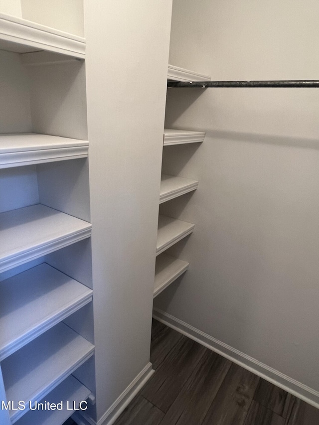 767 Sherwood Dr, Jackson, MS 39216 - spacious closet with dark wood-style floors