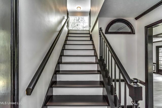 767 Sherwood Dr, Jackson, MS 39216 - stairs featuring a high ceiling