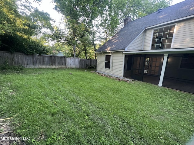 767 Sherwood Dr, Jackson, MS 39216 - view of yard featuring a sunroom