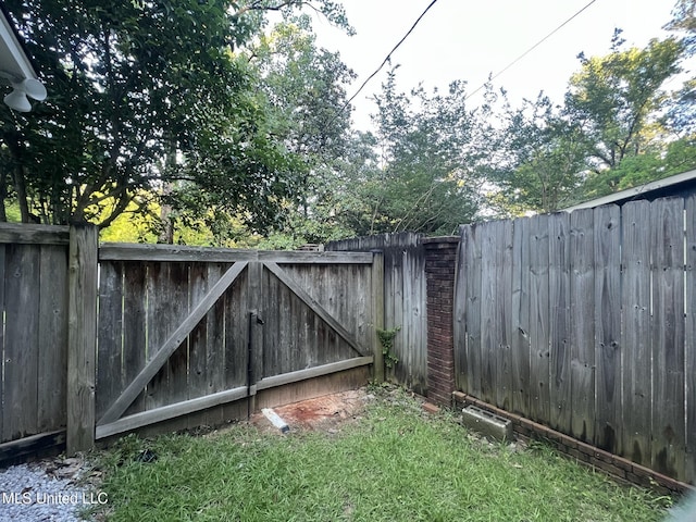 767 Sherwood Dr, Jackson, MS 39216 - gate featuring a fenced backyard